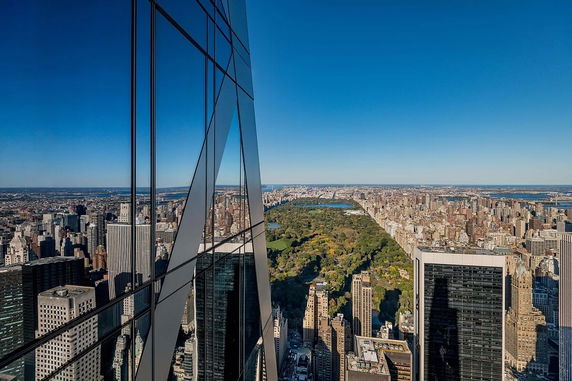 Wide-angle view of a cityscape with a large park and skyscrapers
