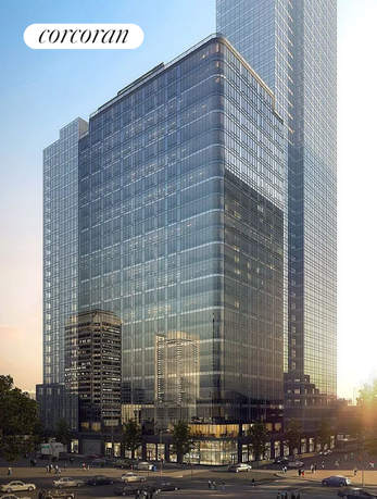 Front view of a modern high-rise building with glass facade.