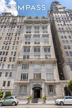 Front view of a multi-story building with ornate architectural details.