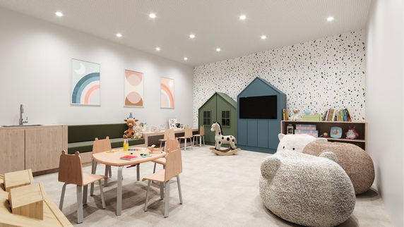Interior view of a children's play area with toys and decorations.
