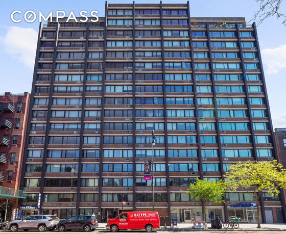 Front view of a multi-story residential building.