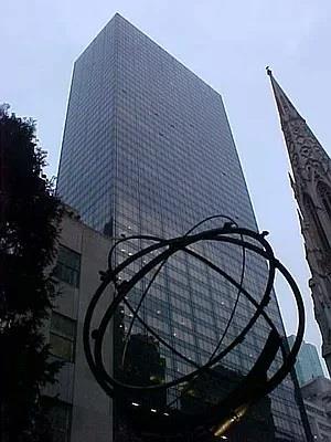 Front view of a tall glass skyscraper