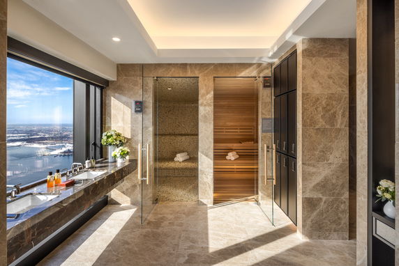 Luxury interior space featuring a sauna and relaxation area.