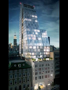 Front view of a modern multi-story building with a unique slanted design.