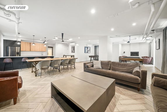 Large club house area with seating, dining, and entertainment spaces.