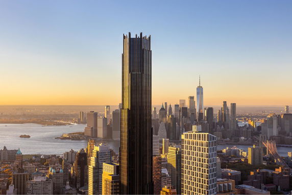 Panoramic view of a city skyline with a prominent tall building in the foreground.