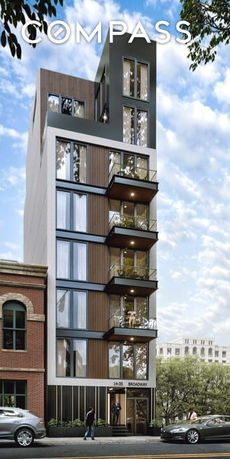 Front view of a modern multi-story residential building with balconies.