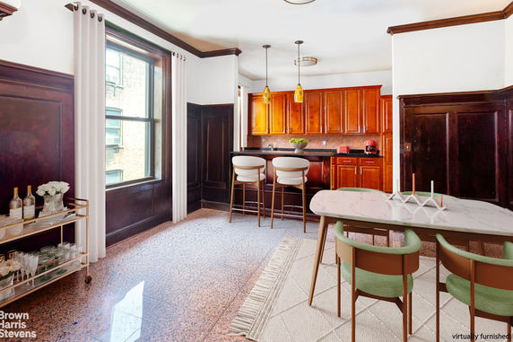 Front view of a single-story house with a pool.