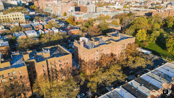 Aerial view of buildings with visible rooftops.