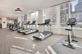 Fitness room with treadmills and exercise bikes.
