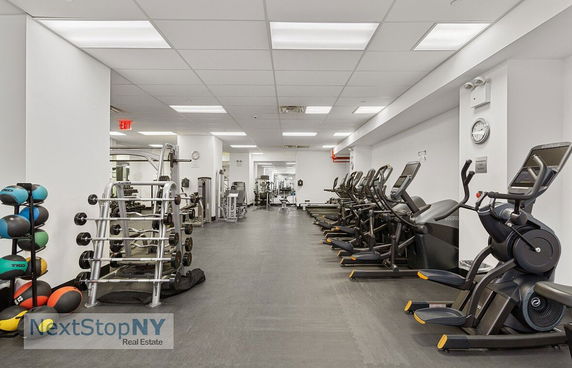 Interior view of a gym with exercise equipment.