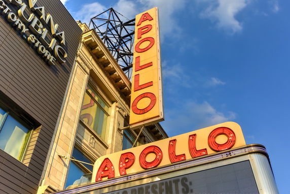 Front view of a building with a prominent Apollo sign.