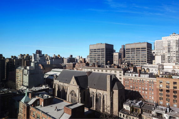 Wide angle view of urban buildings and skyline.