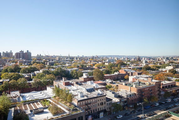 Panoramic view of an urban landscape with multiple buildings.