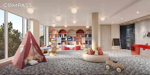 Indoor play area with a teepee tent, colorful seating, and educational toys.
