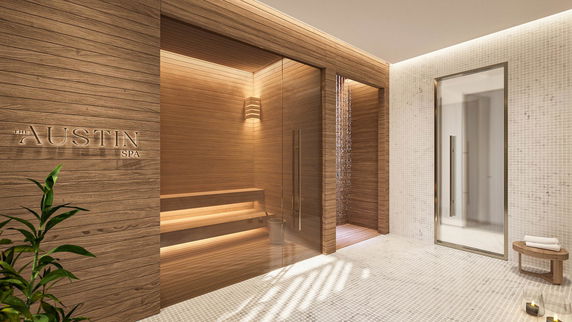 Interior view of a spa with a wooden sauna room and modern design.