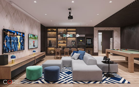 Recreation room with seating, two TVs, pool table, and arcade games.