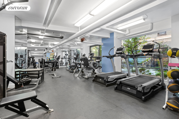 Indoor gym with exercise machines and weights