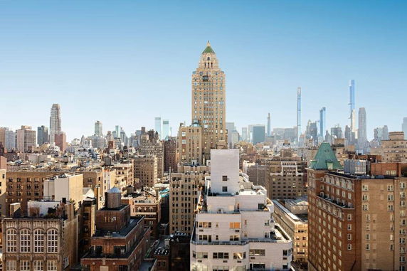 Panoramic view of a city skyline with multiple high-rise buildings.