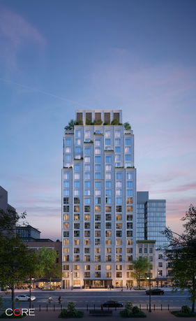 Front view of a multi-story residential building with a modern design.