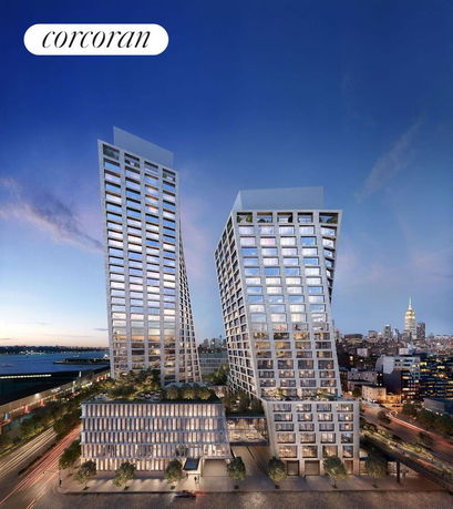 Front view of a modern high-rise building complex with two towers.