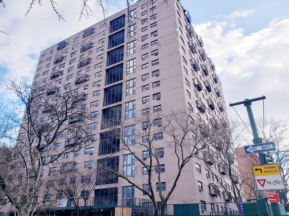 Front view of a multi-story residential building.