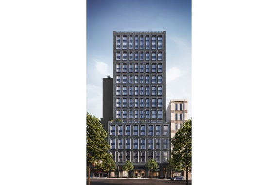 Front view of a high-rise building with numerous windows.