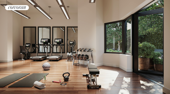 Indoor gym area with treadmills, weights, and exercise equipment.