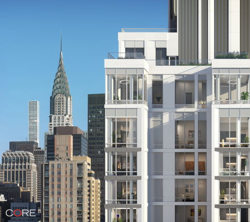 Front view of a modern high-rise building with large windows.
