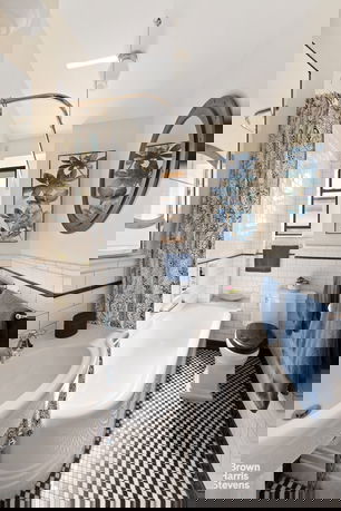 Front view of a McDonald's fast-food restaurant with its signature golden arches.