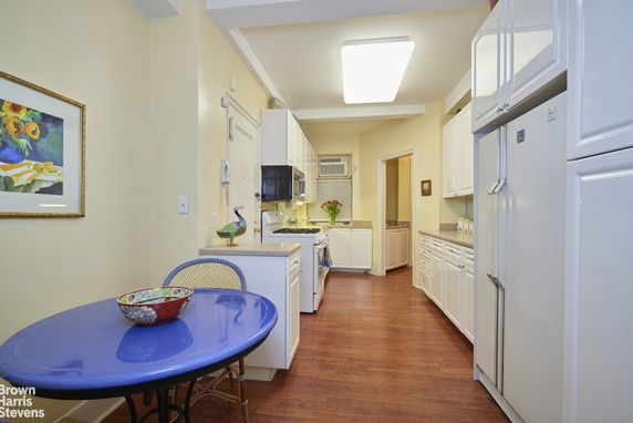 Room with tables, chairs, and arcade machines