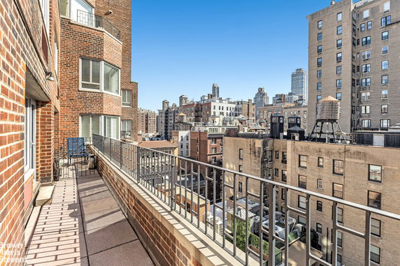 View of surrounding buildings from a balcony.