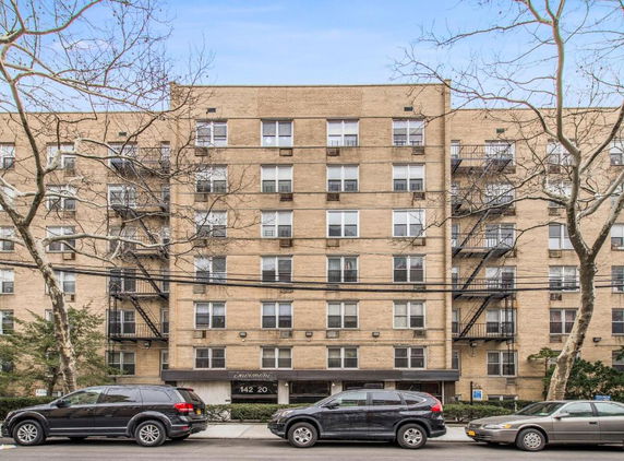 Front view of a multi-story apartment building.