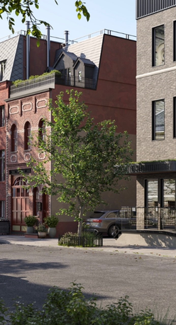 Front view of a multi-story building with brick and modern facade.