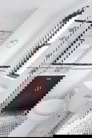 Front view of a multi-story building with distinct architectural design.