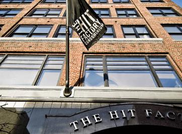 Front view of a multi-story brick building.