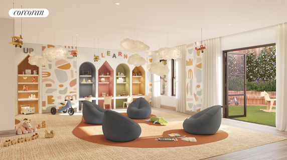Interior of a children's play area with seating and toys, decorated with colorful shelves and hanging clouds.