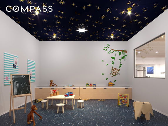 Indoor play area with toys and child-friendly decor.