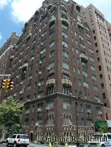 Front view of a multi-story brick building.