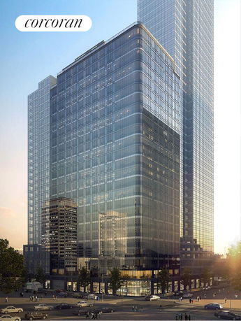 Front view of a modern high-rise building with glass exterior.