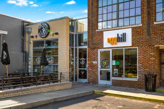 Front view of a commercial building with two storefronts.