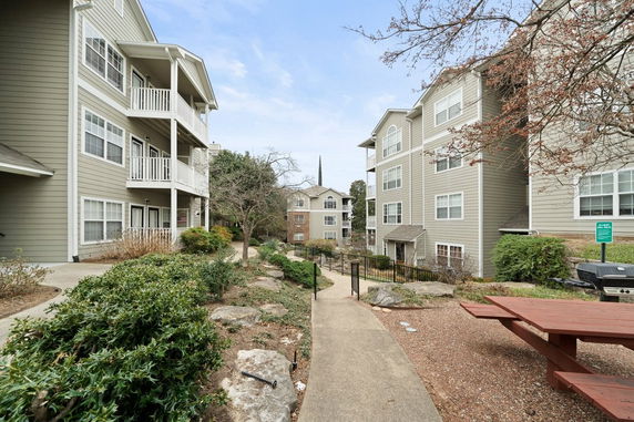 View of multi-story residential buildings with balconies.
