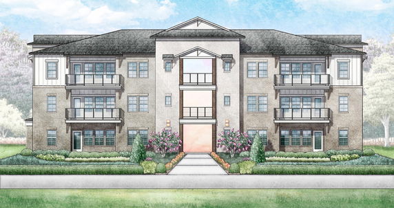 Front view of a three-story apartment building with balconies.