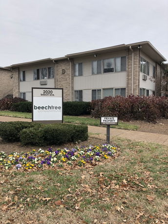 Front view of a two-story condominium building.