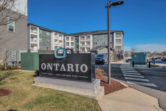 Front view of a multi-story apartment building.