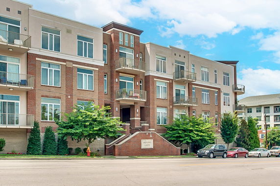 Front view of a multi-story apartment building.