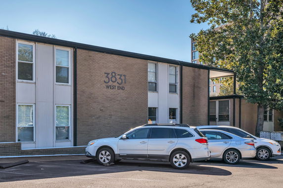 Front view of a two-story building with brick facade.