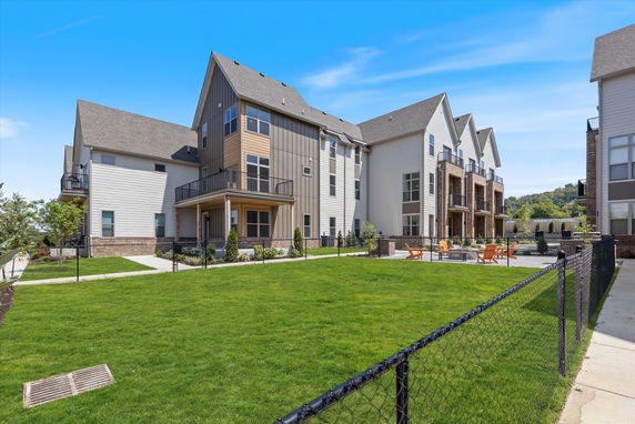 Front view of modern multi-story residential buildings.