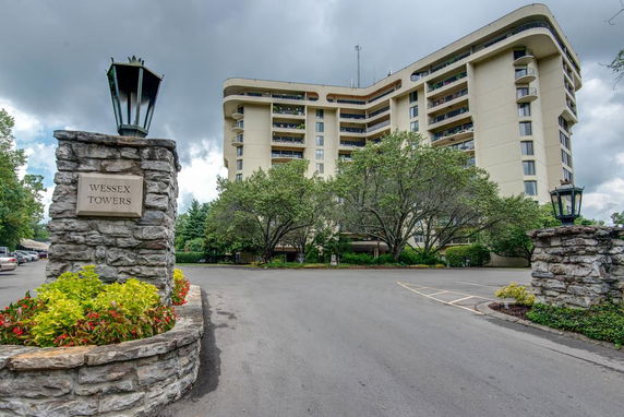 Front view of a multi-story residential building named Wessex Towers.