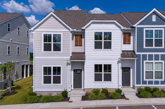 Front view of a two-story house with a modern design.